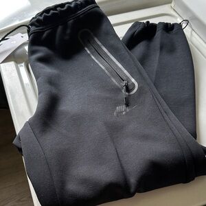 Nike Tech Black Athletic Joggers with Zipper Detail